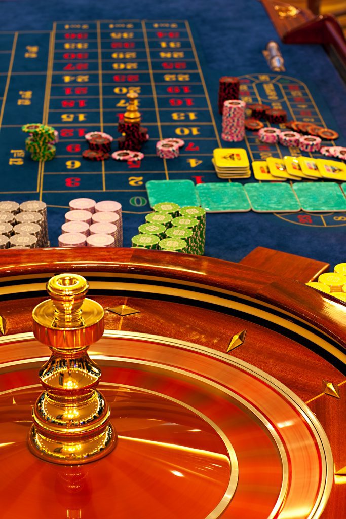 Partial View of a Spinning Roulette Wheel & Table
