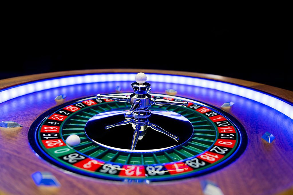  Roulette wheel numbers on roulette table.
