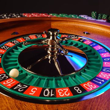 Roulette players in the casino.