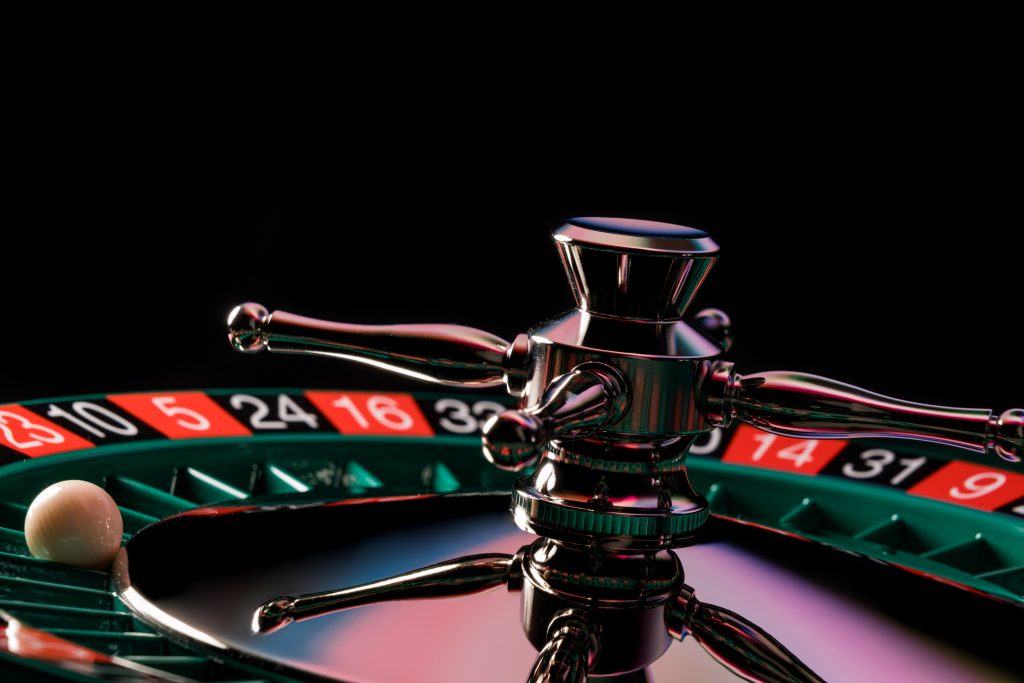Roulette players in a casino.

