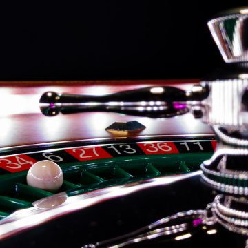 Roulette players in a casino.