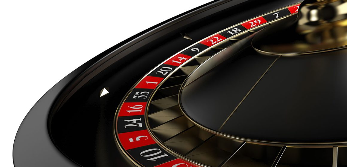 Roulette players spinning the wheel